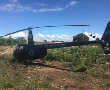 Helicóptero da PCPR pousado no local do crime para dar apoio a reconstituição