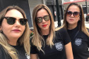 Três mulheres policiais civis posando para foto