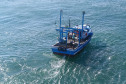 Barco com pescadores