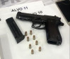 Pistola apreendida na ação