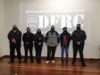 Policiais civis aparecem em foto durante palestra na RMC