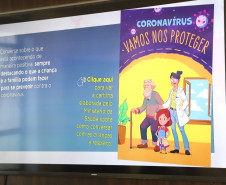 Imagem da cartilha na tela de uma televisão