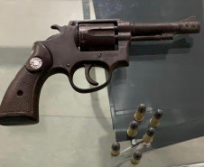 Arma apreendida na ação