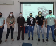 Envolvidos no evento posando para foto