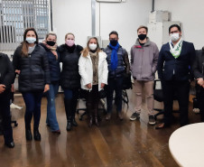 Envolvidos no evento reunidos para fotografia