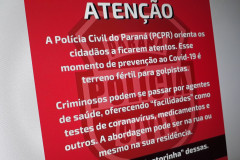 Arte com aviso sobre golpes