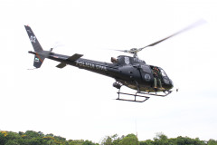 Helicóptero da polícia civil em voo
