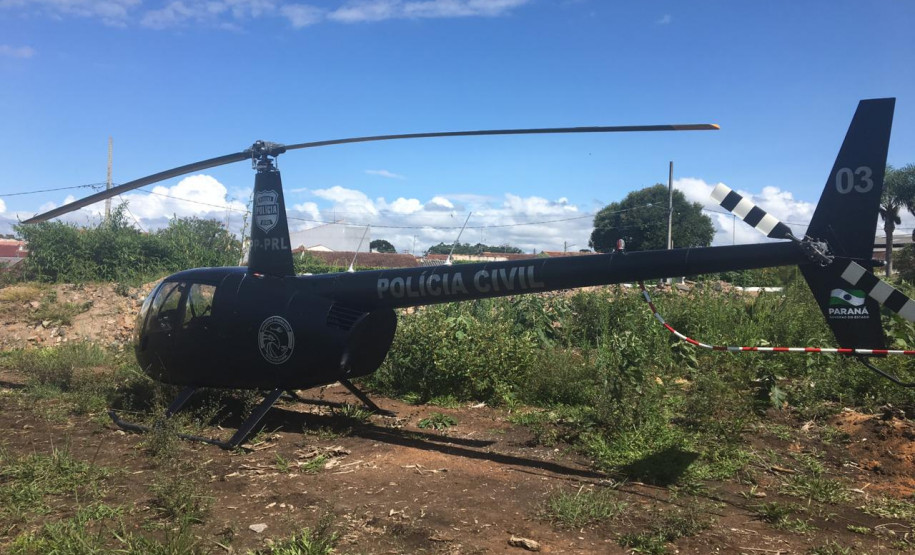 Helicóptero da PCPR pousado no local do crime para dar apoio a reconstituição